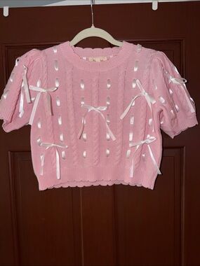 Peach Love California Pink Ribbon-Embellished Cable Knit Top